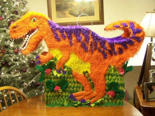 Piñatas de dinosaurios naranja piñata